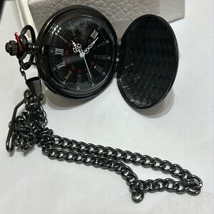 NIB. Black pocket watch with chain.